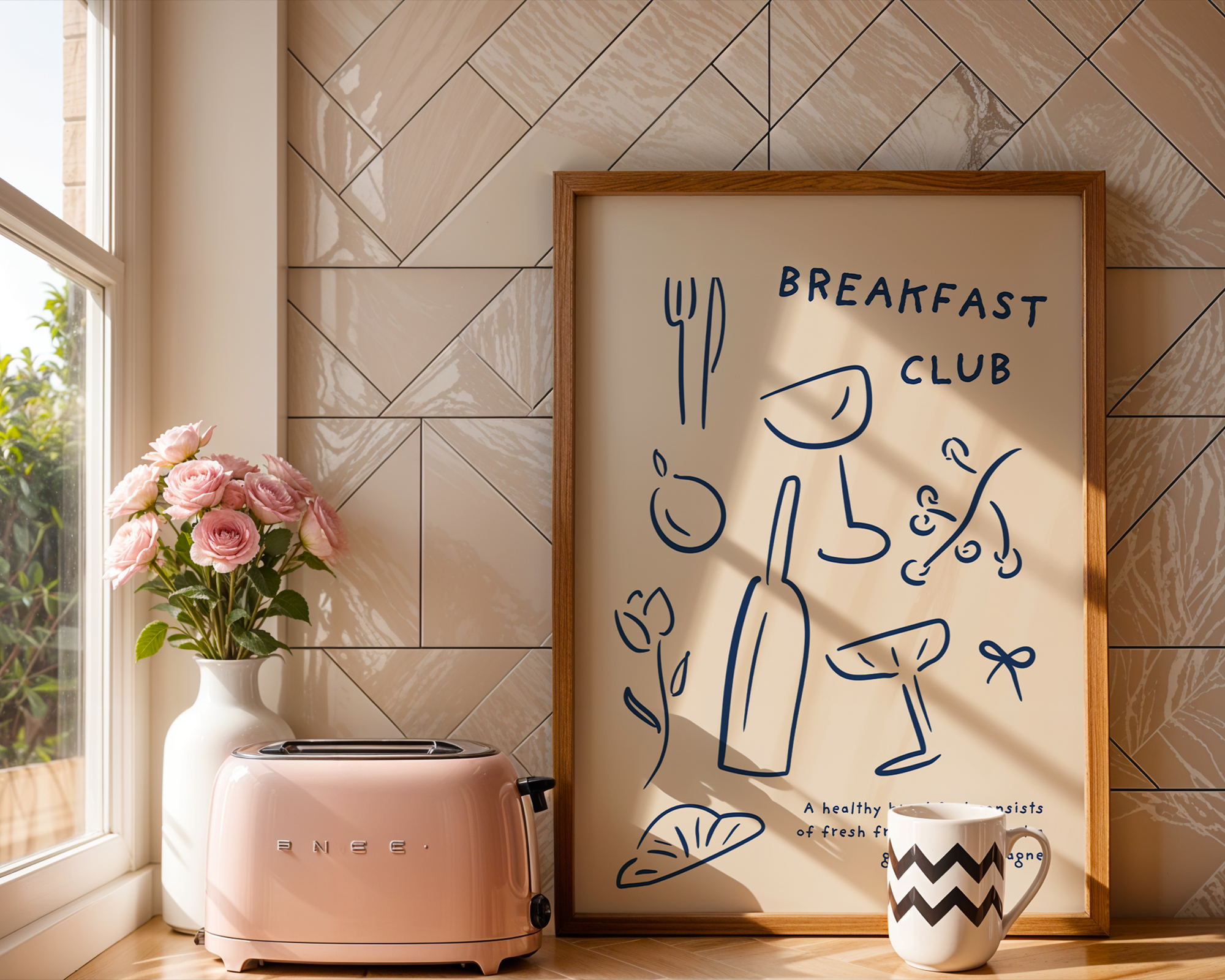 Kitchen scene with a pink toaster, vase of flowers, and framed artwork titled 'Breakfast Club'.