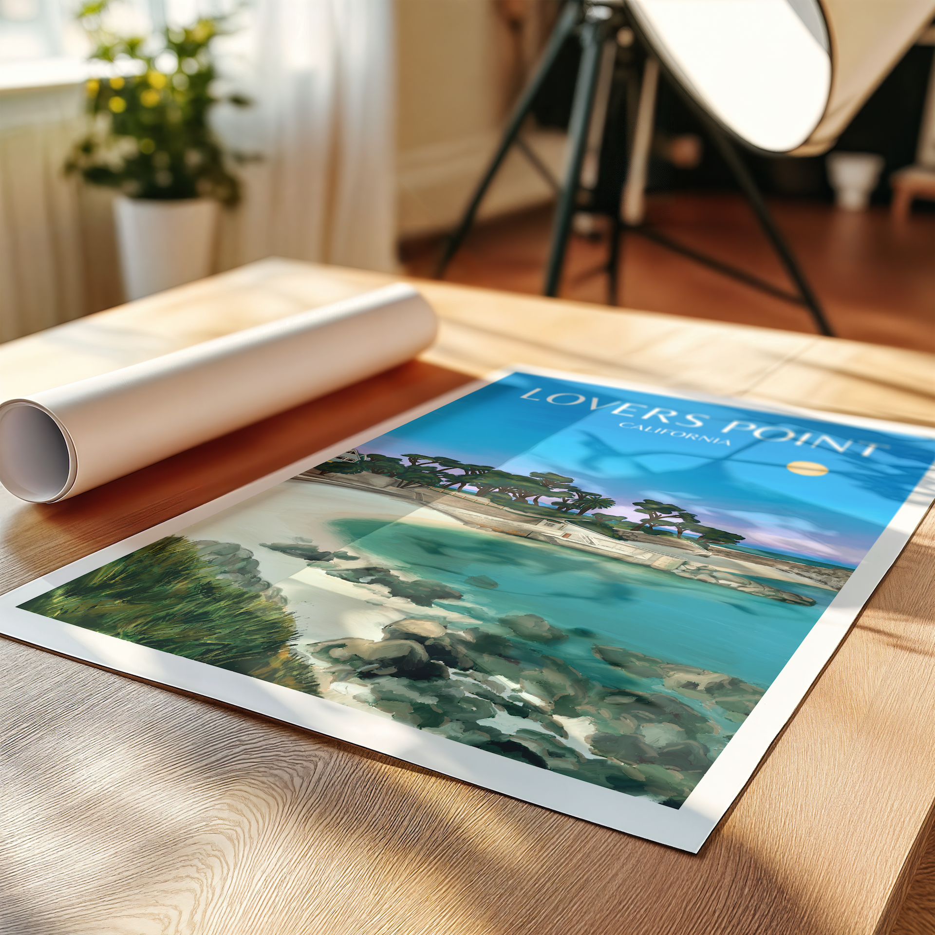 A vibrant travel print of Lovers Point beach on a table surrounded by decorative items and plants.
