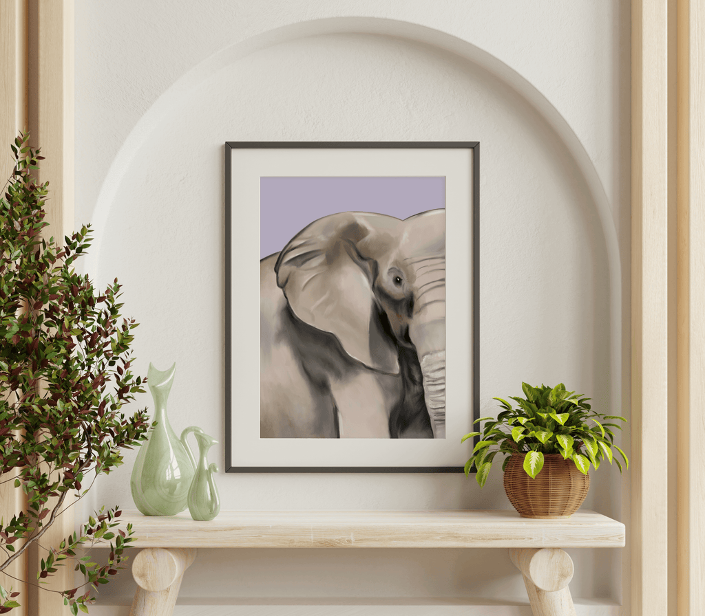 Art print displayed in a wall hung frame featuring a illustration of an elephant against lilac background. Print is displayed in a room with decorative items and plants.