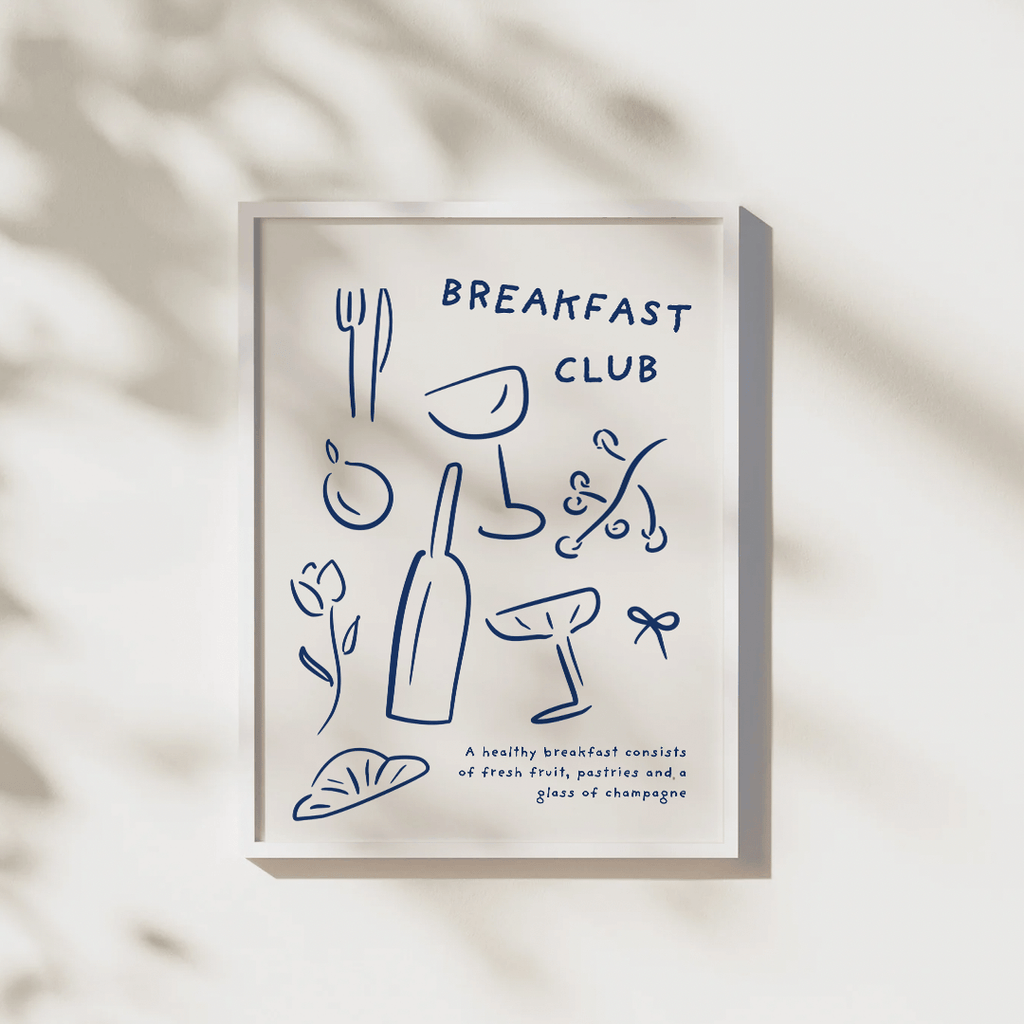 Framed kitchen artwork with 'Breakfast Club' text and illustrations on a beige background