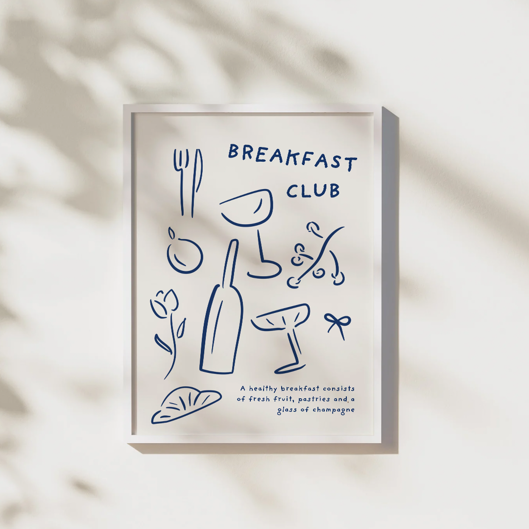 Framed artwork with 'Breakfast Club' text and illustrations on a beige background