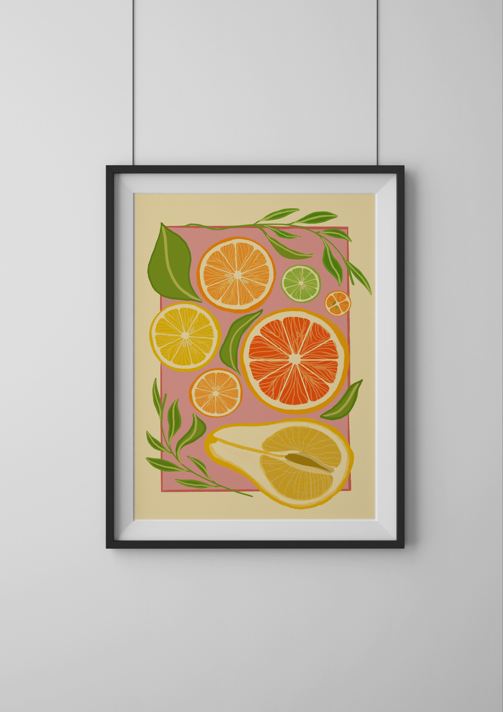 Framed artwork of citrus fruits on a beige background