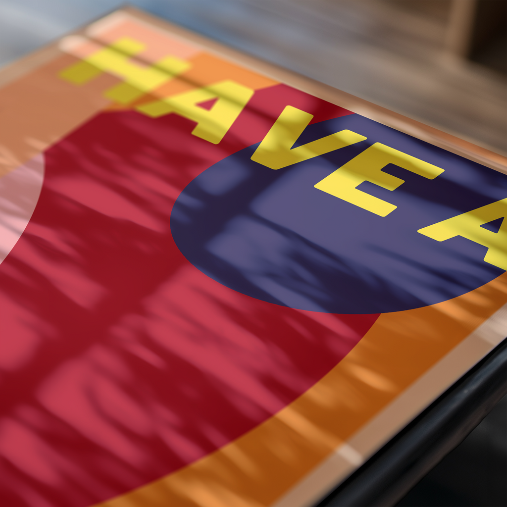 Close-up of a colorful art print with text and logo