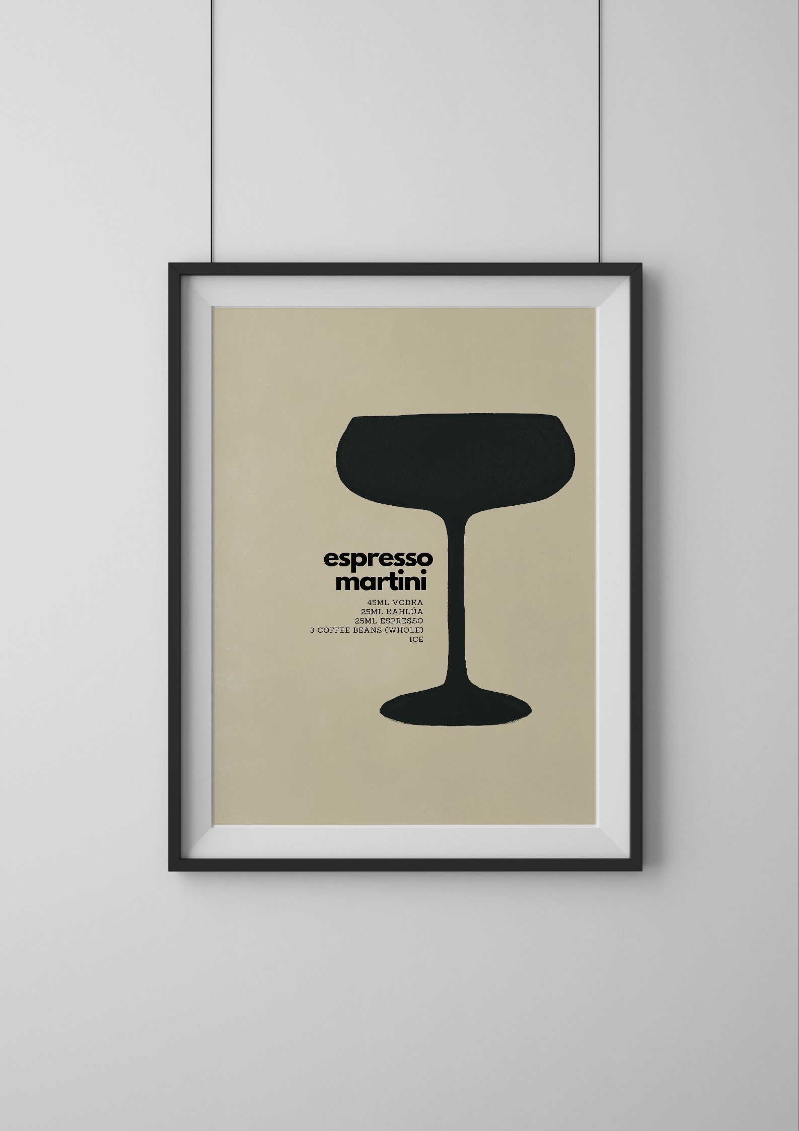Framed poster of an espresso martini glass design on a beige background