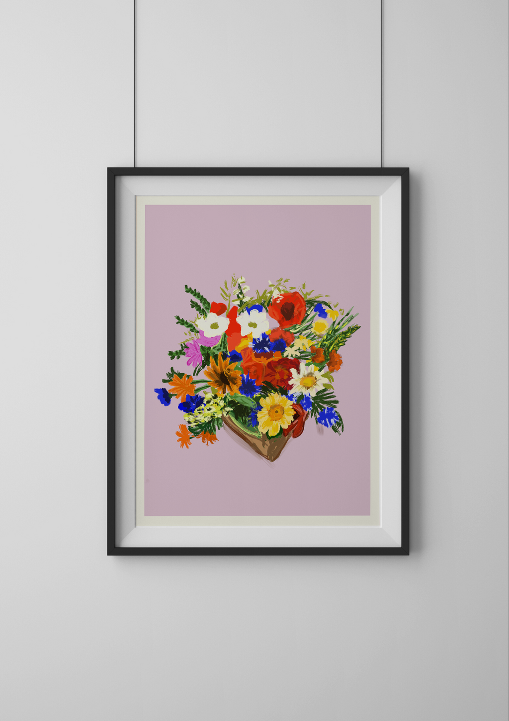 Framed artwork of a colorful floral arrangement on a light purple background