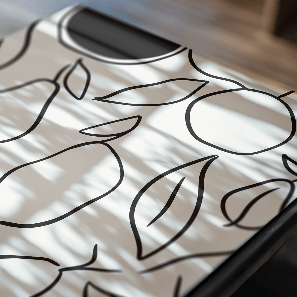 Close-up of a fruit market art print with black line patterns