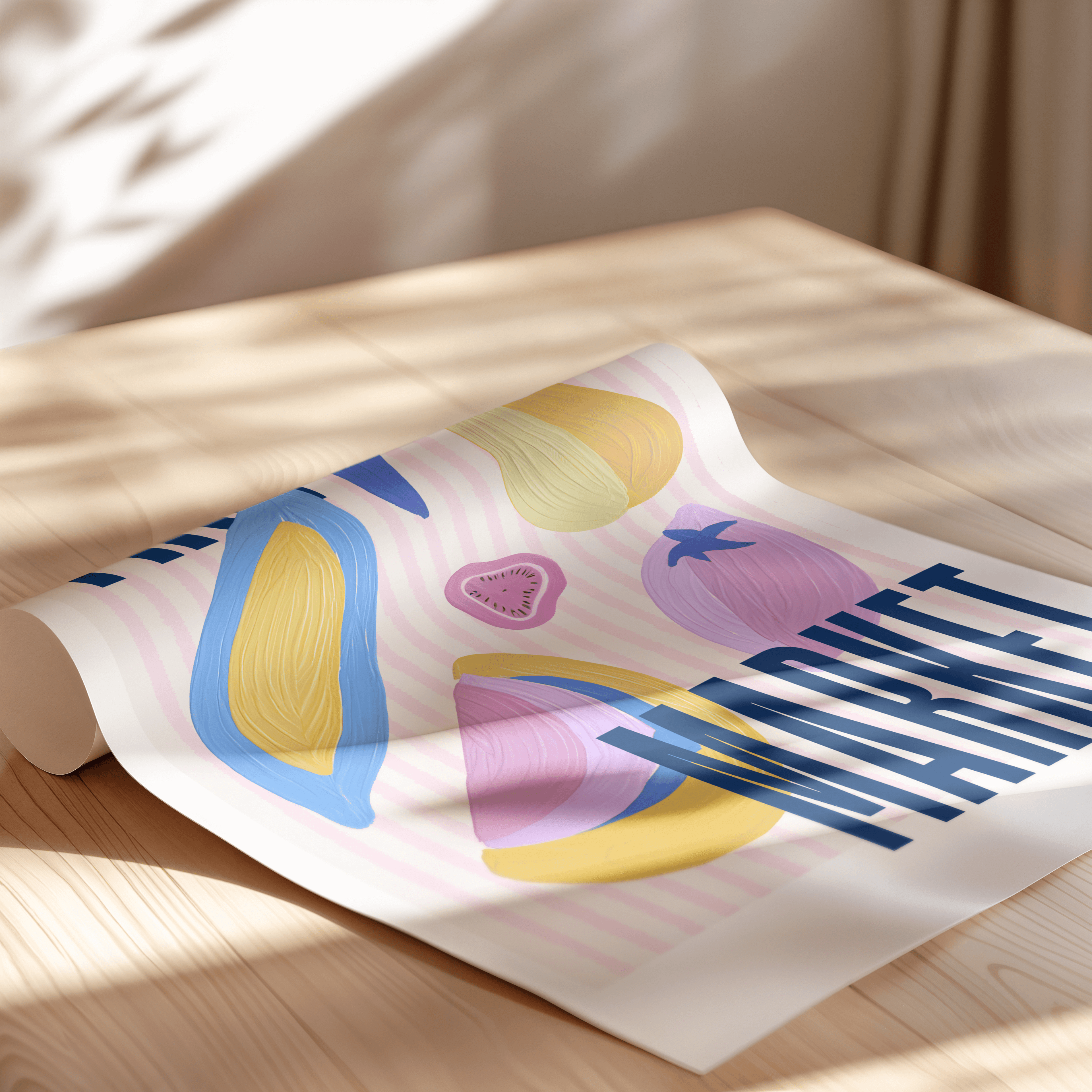 Colourful abstract design on a roll of paper with 'Fruit Market' text, placed on a wooden surface.