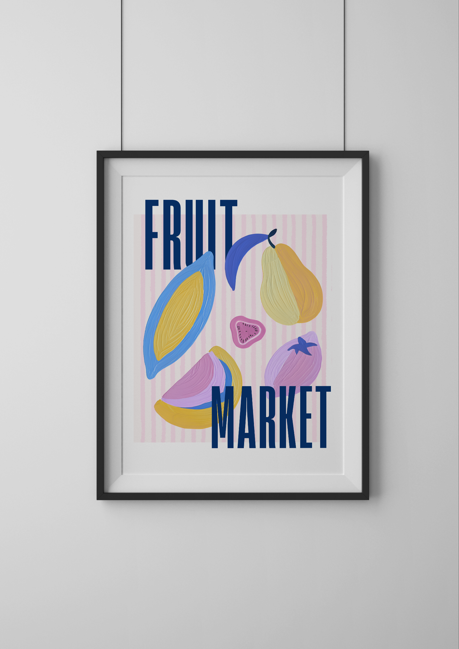 Framed artwork with colorful fruit illustrations and 'Fruit Market' text on a light gray wall.
