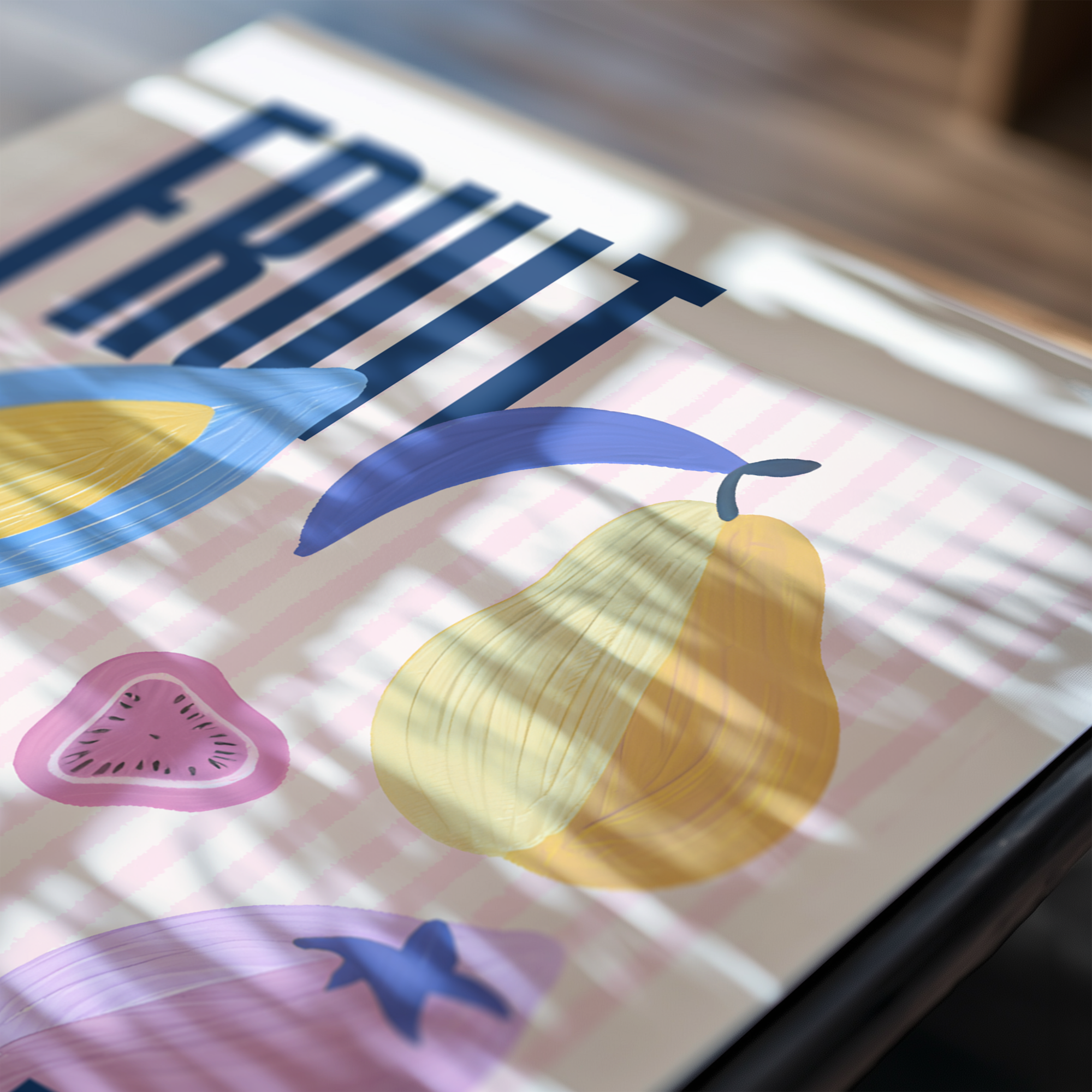 Colorful fruit illustrations on a digital screen with 'Fruit' text.
