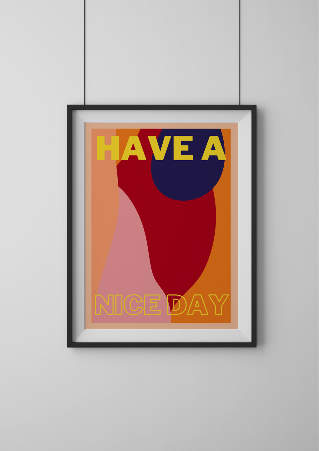 Framed poster with 'HAVE A NICE DAY' text on a plain wall