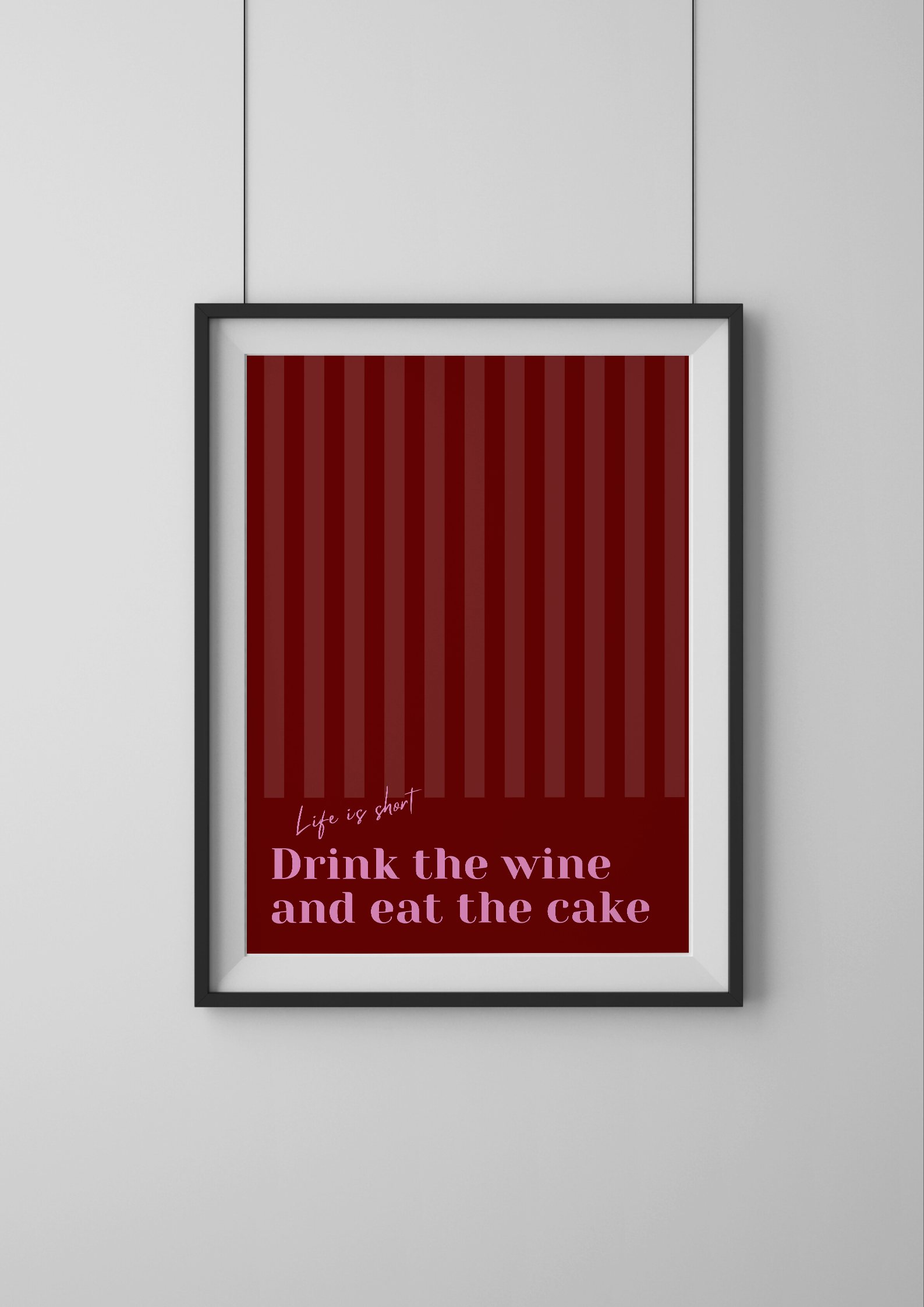 Framed red poster with text on a white wall
