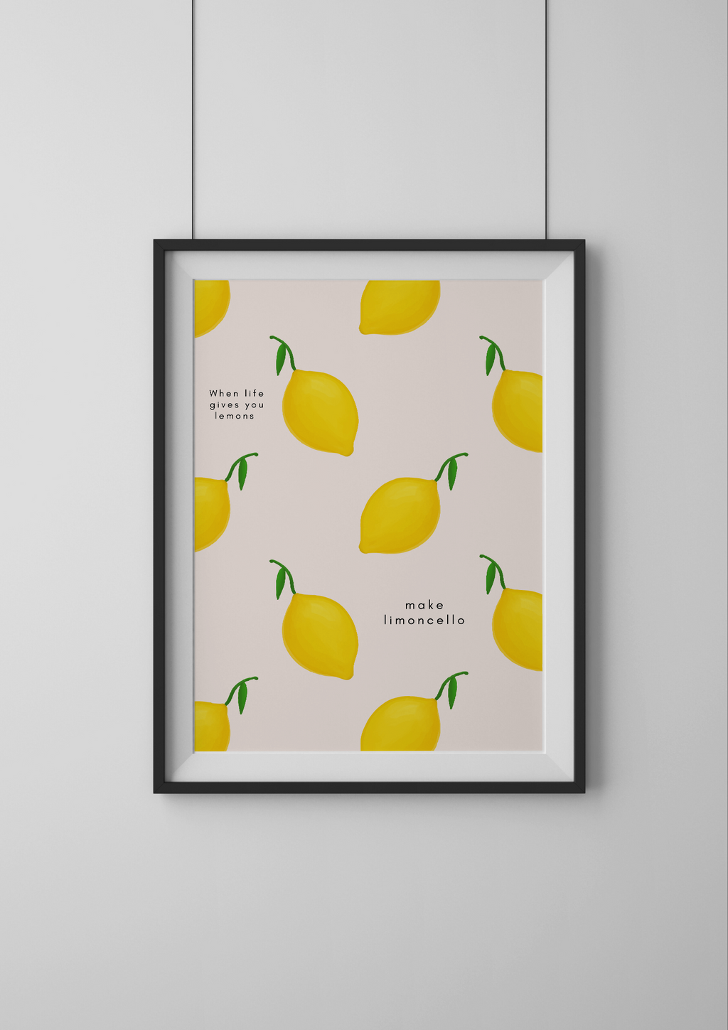 Framed artwork with lemon pattern and text on a light background