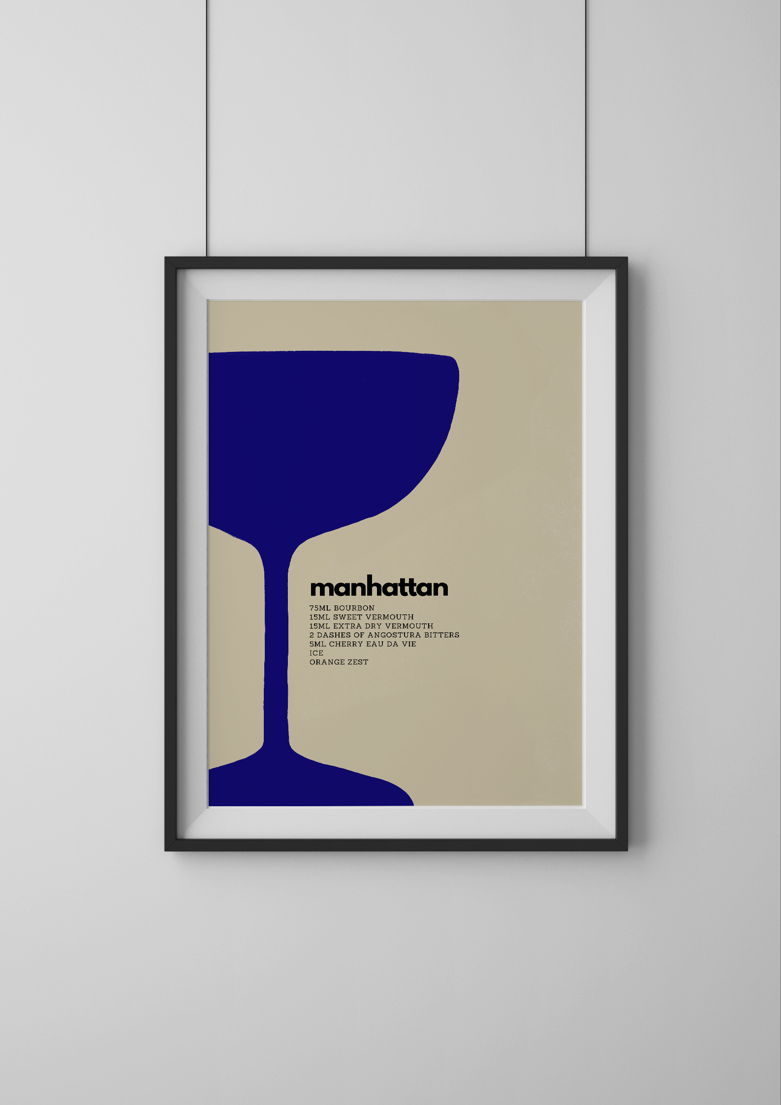 Framed poster with a blue wine glass silhouette and 'manhattan' text on a beige background.
