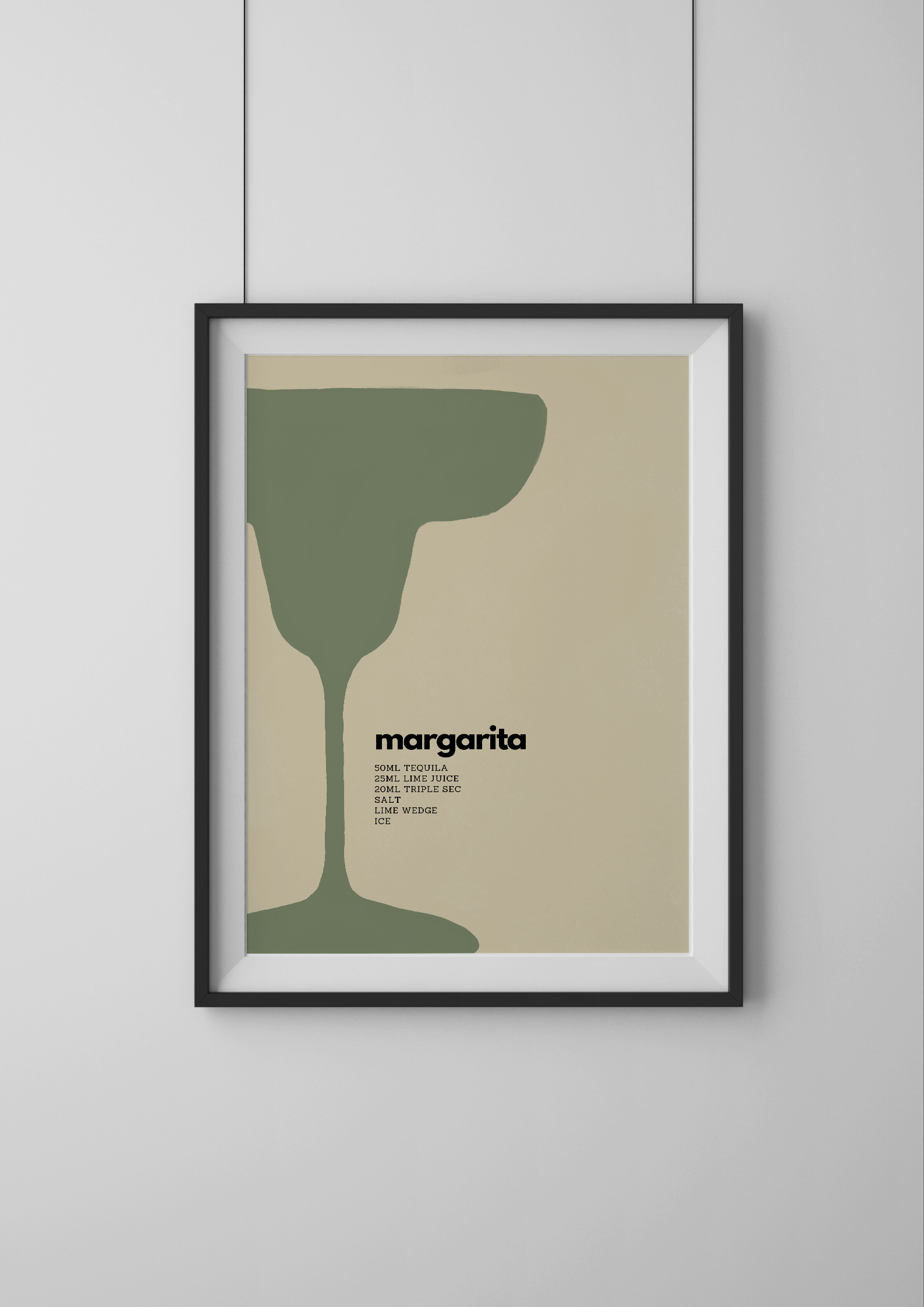 Framed poster of a margarita glass design on a light gray wall.