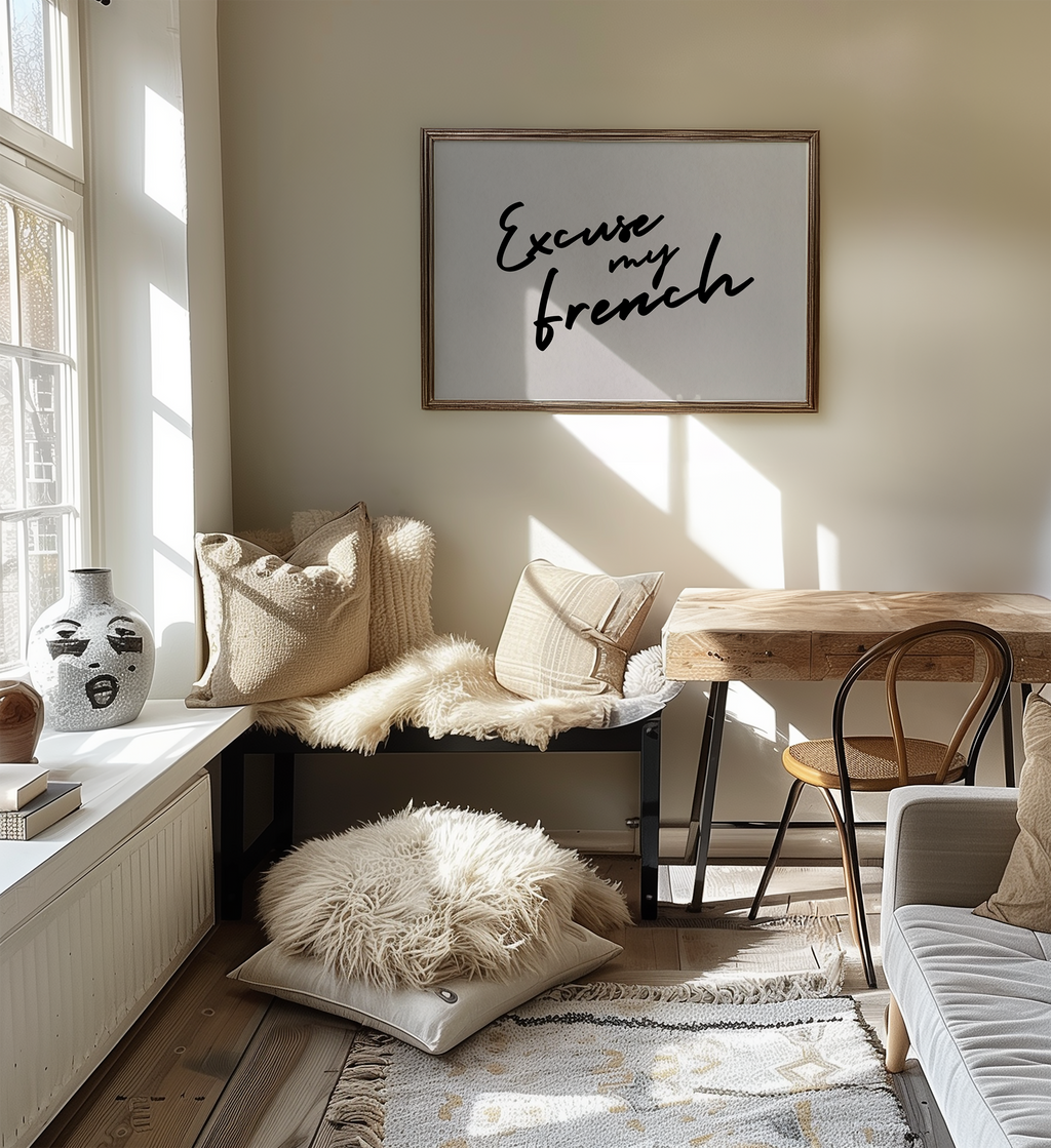 Cozy living room with a wooden bench, cushions, and a framed picture on the wall.