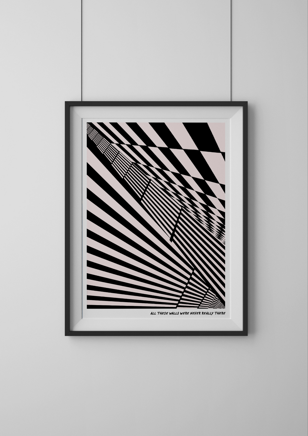Framed black and white abstract art print on a light gray wall