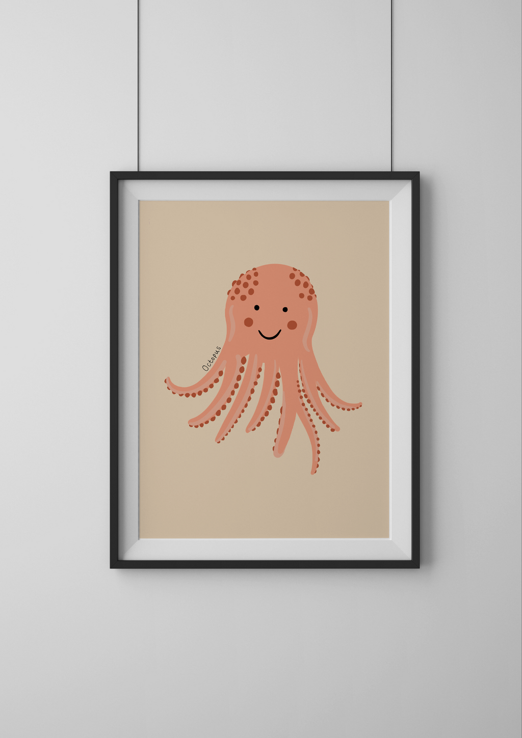 Framed illustration of a pink octopus on a beige background