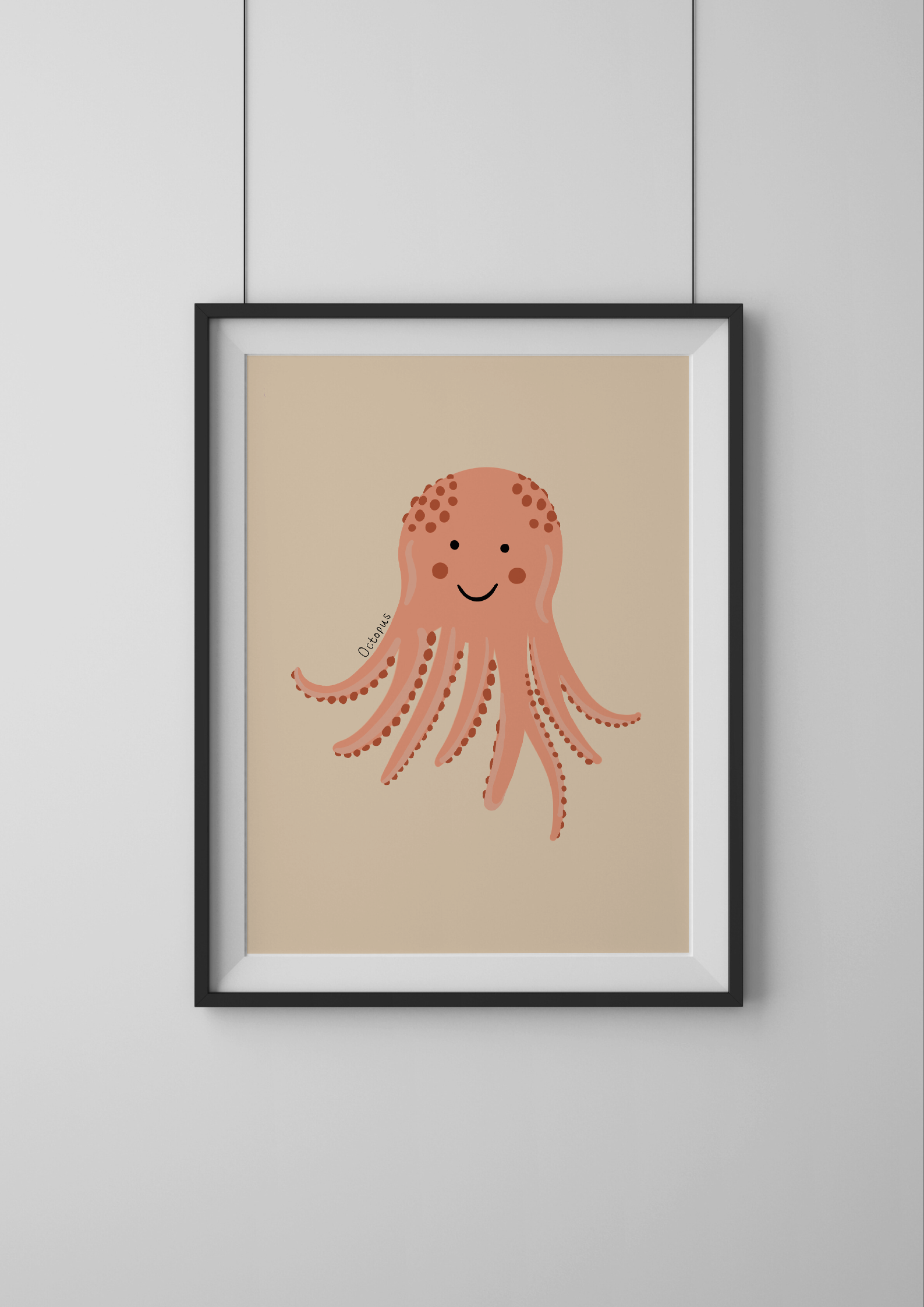 Framed illustration of a pink octopus on a beige background