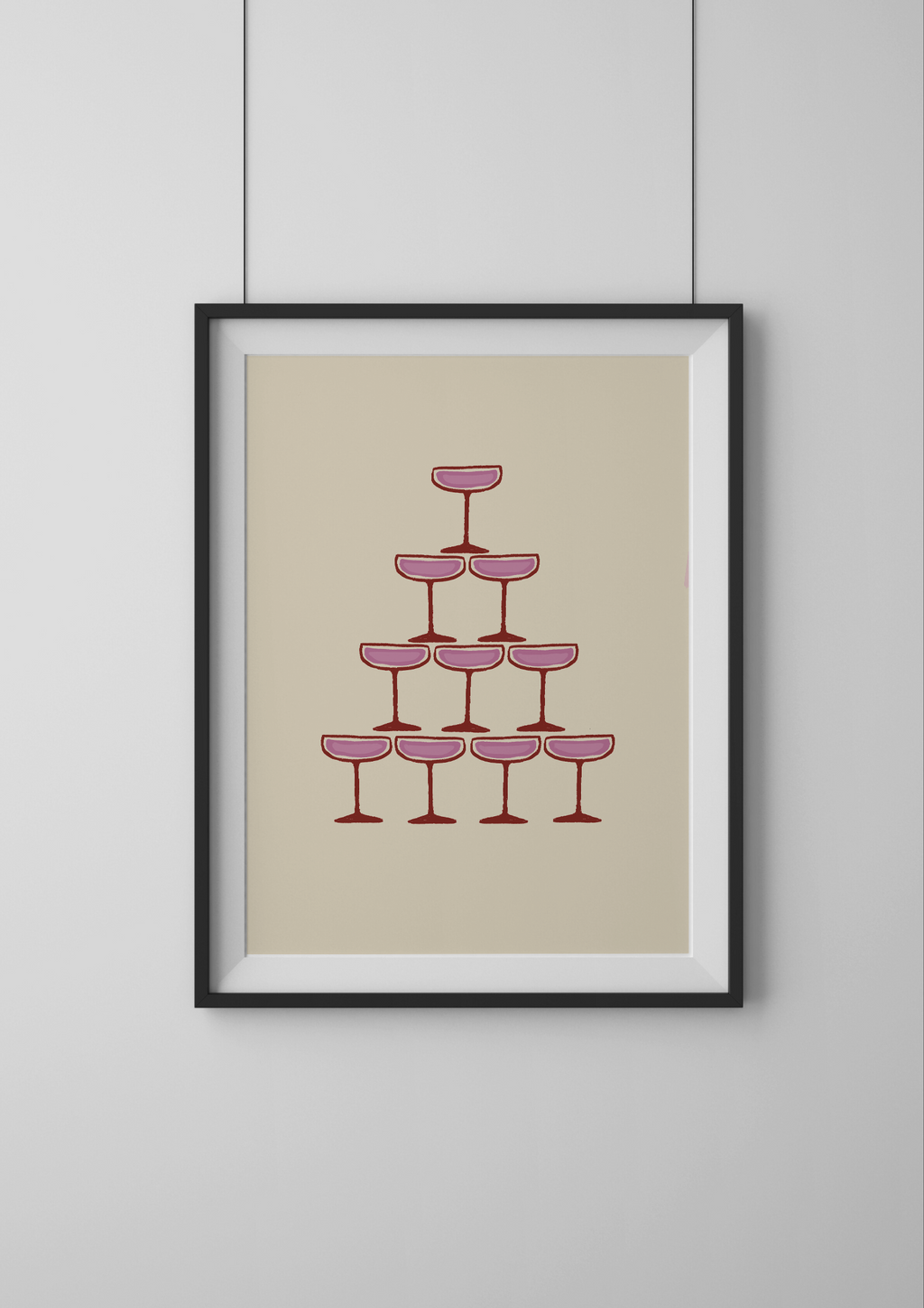 Framed artwork of a pyramid of pink cocktail glasses on a beige background