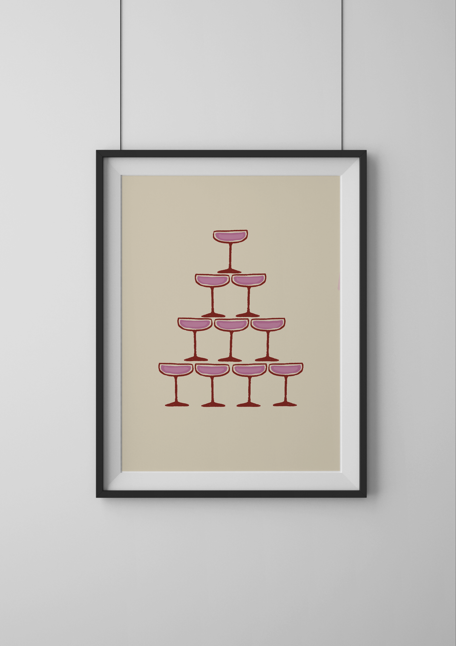 Framed artwork of a pyramid of pink cocktail glasses on a beige background
