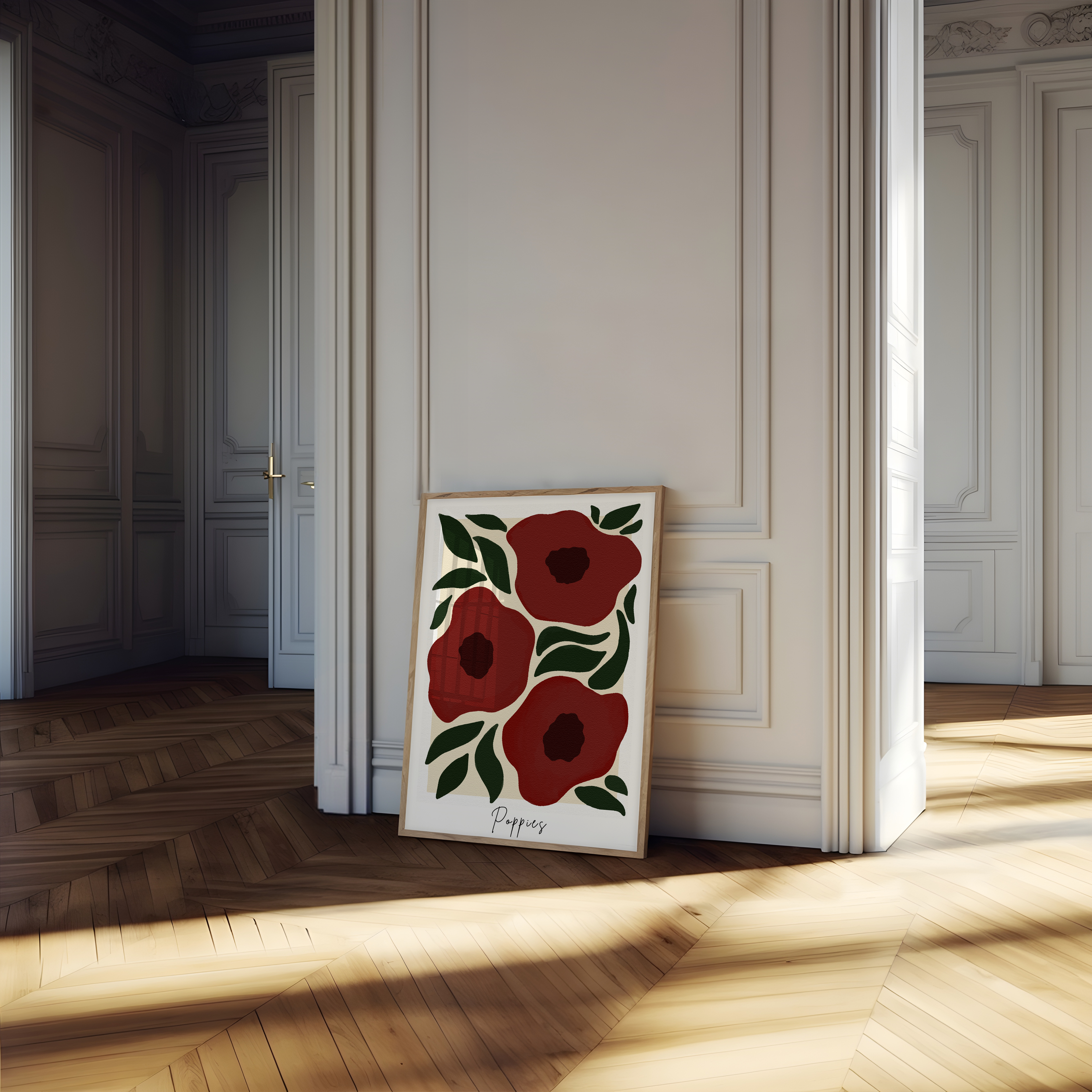 Red flower poppy art print leaning against a wall in a neutral decor room.
