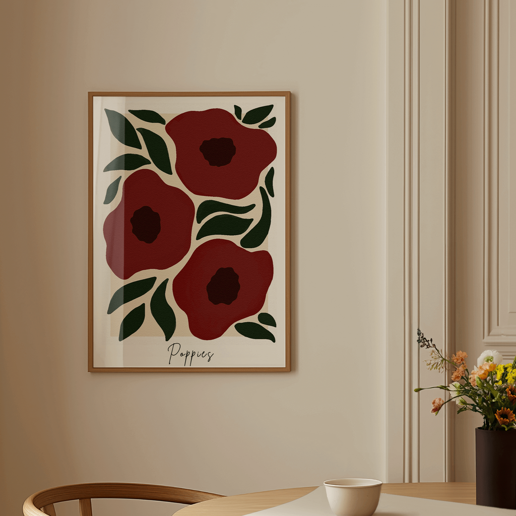 Dining room with a wooden chair, table, and floral artwork on the wall.