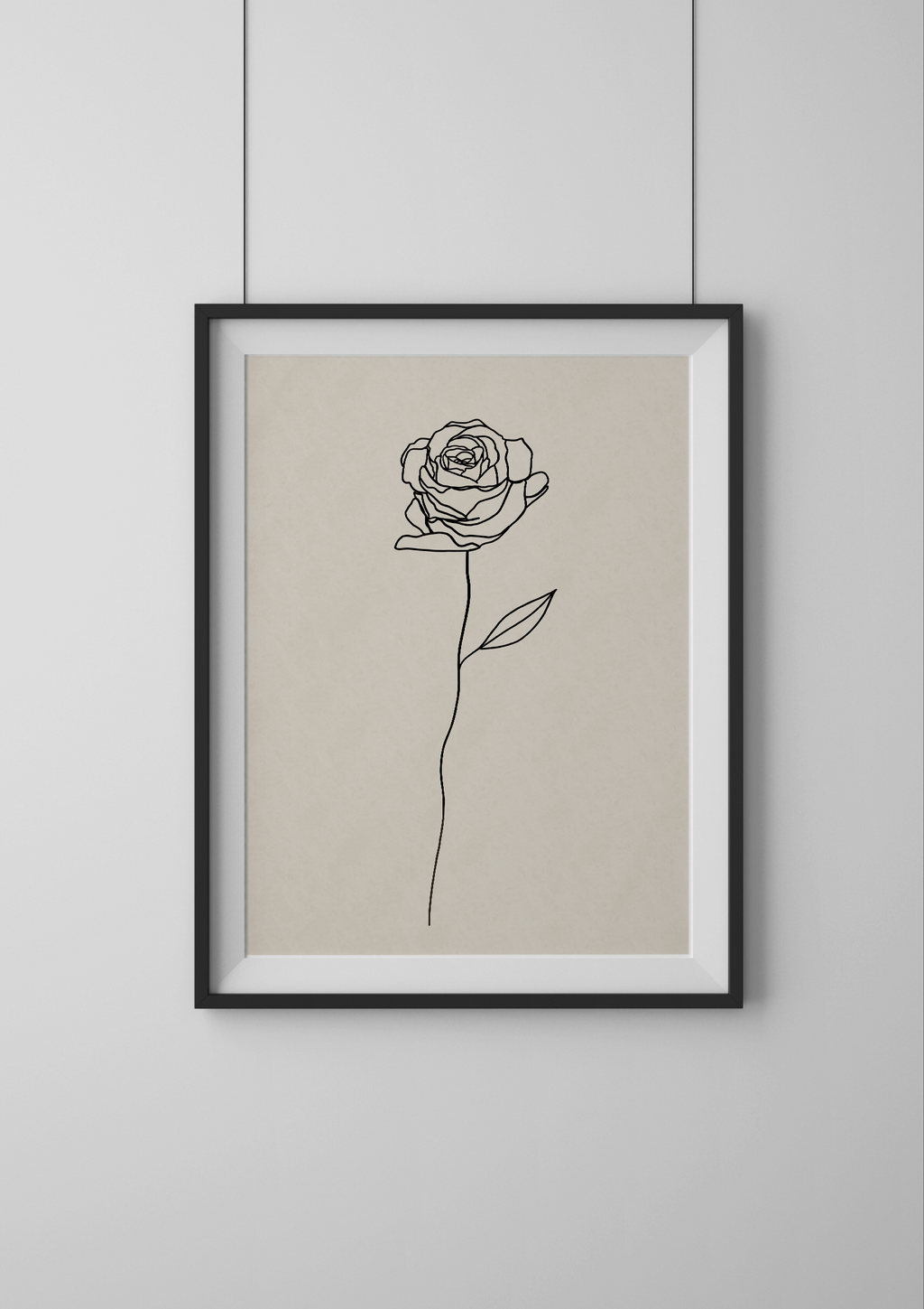 Framed line art of a rose on a beige background