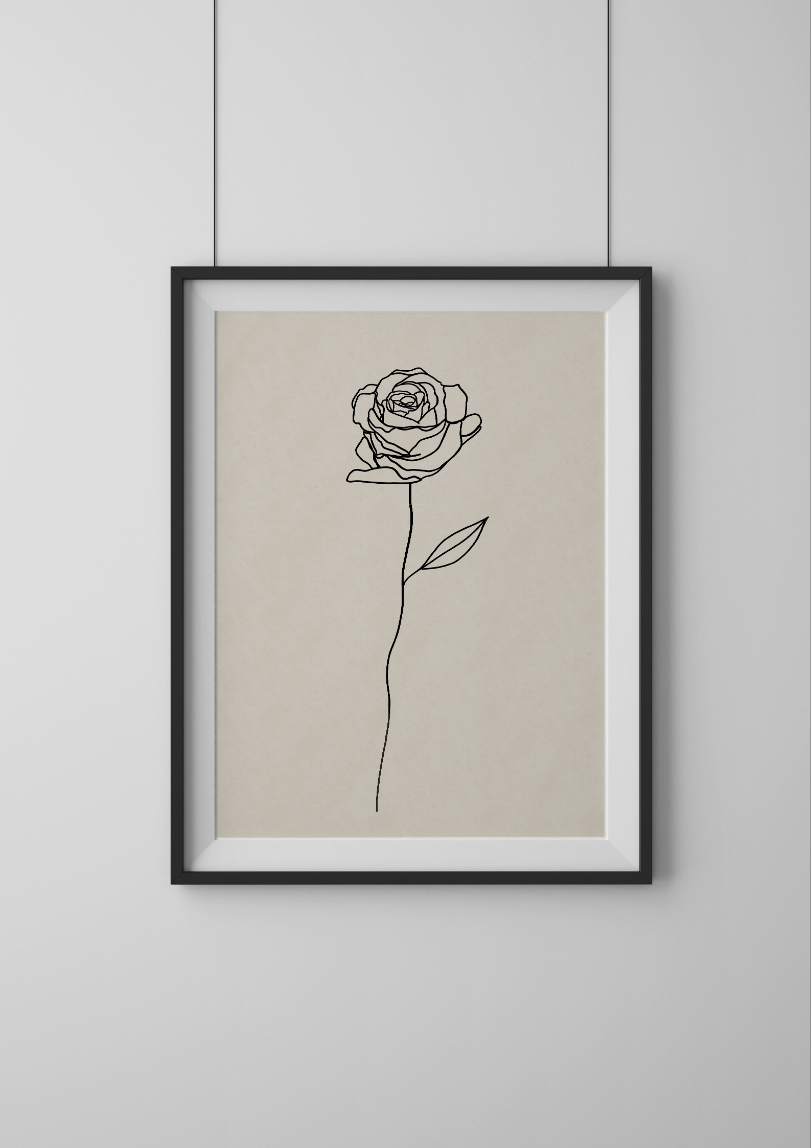 Framed line art of a rose on a beige background