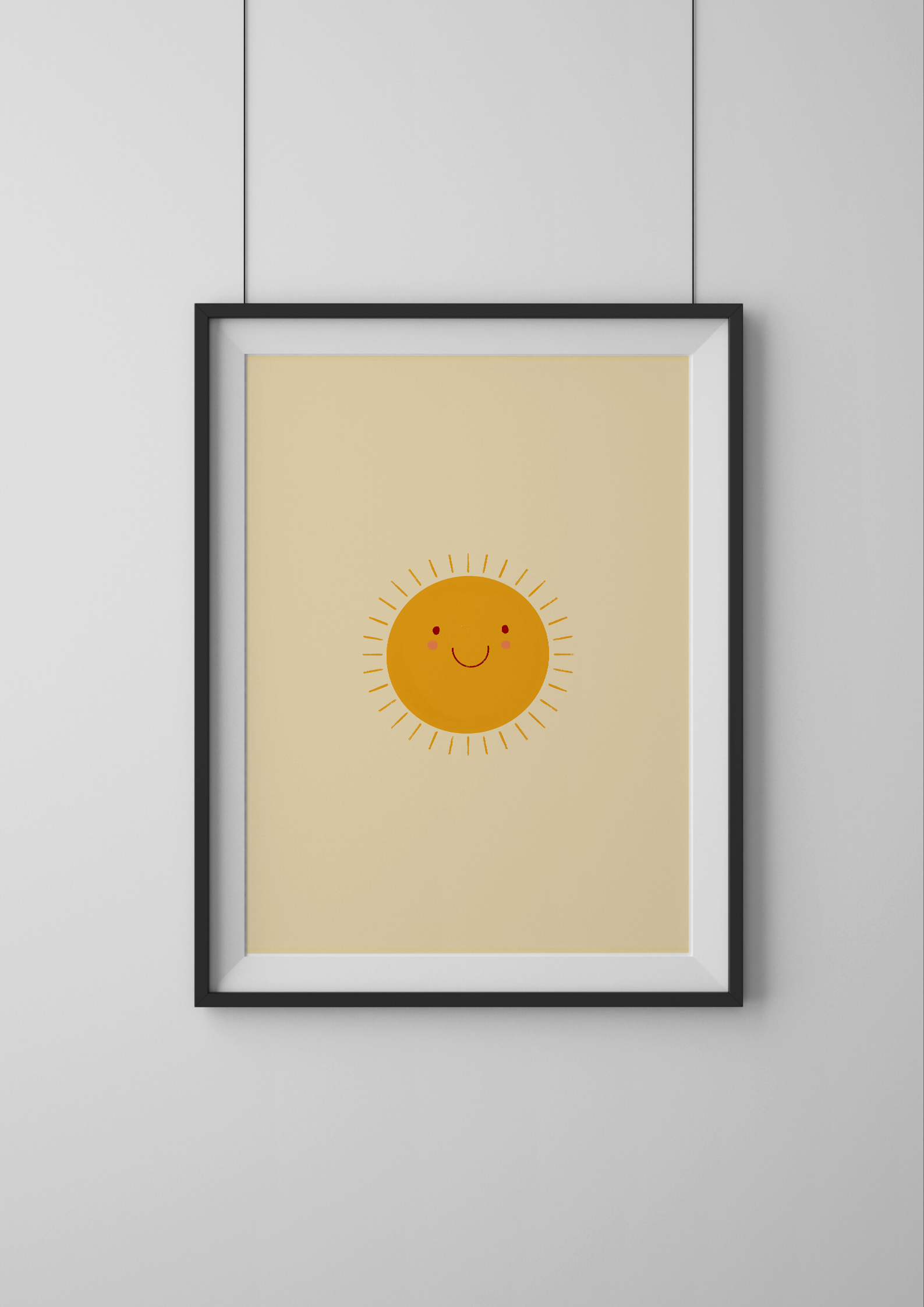 Framed artwork of a smiling sun on a beige background