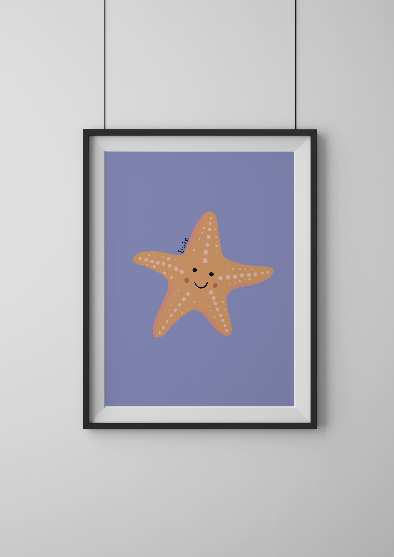 Framed artwork of a smiling starfish on a purple background