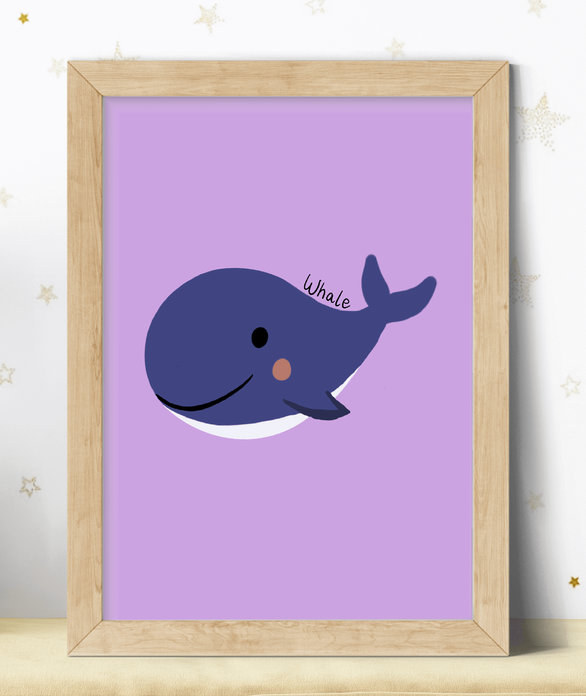 A colourful print featuring a purple whale illustration, in a wooden frame.